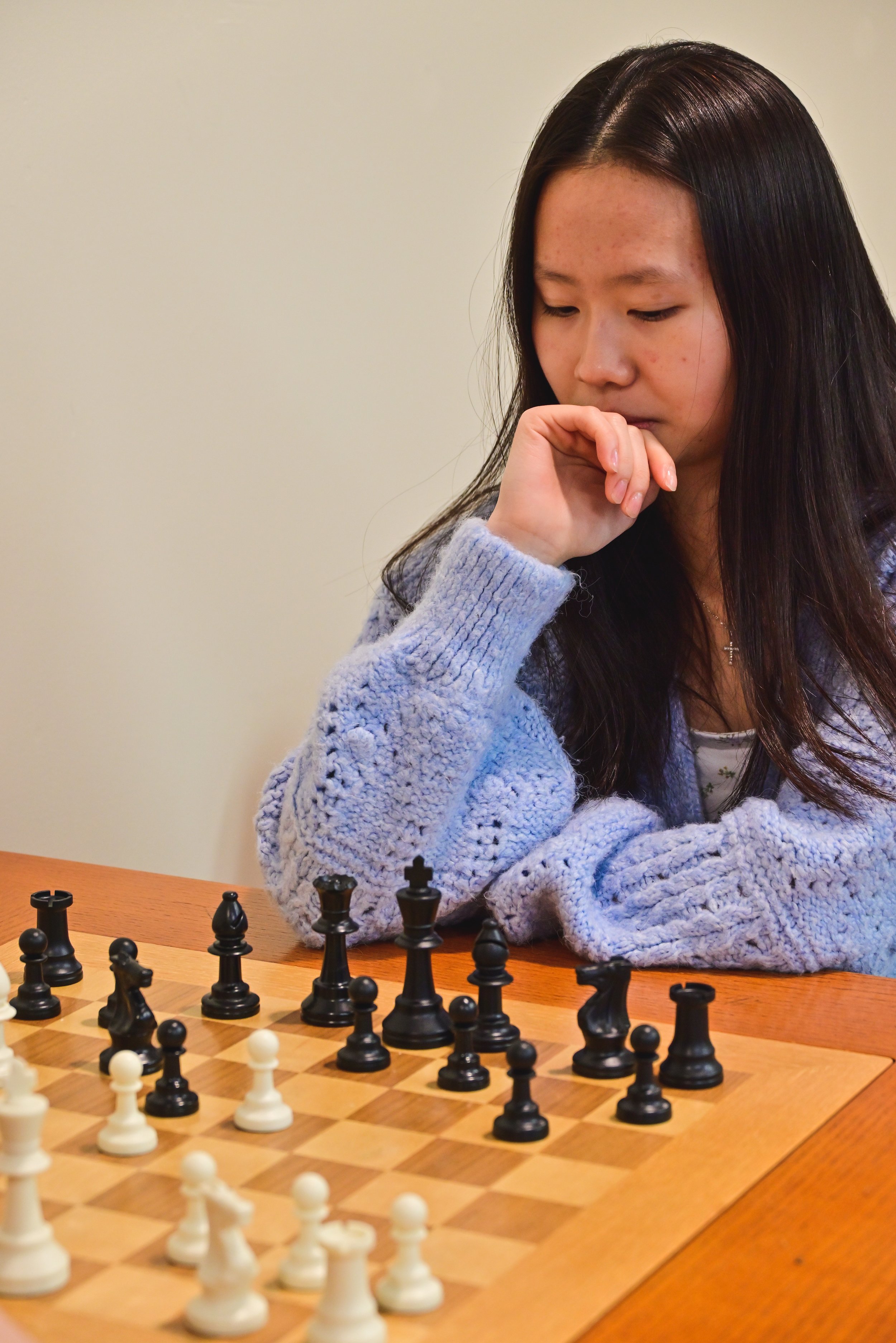Amelie Chan thinking about a difficult position