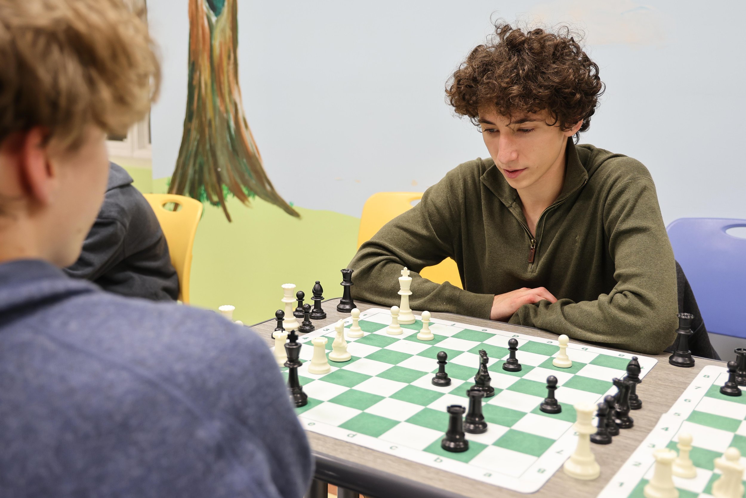 Max Depaul playing an intense game of chess